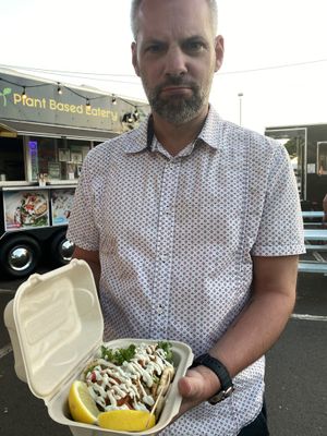 Was mad that he had to share!!!  at Earth Aloha Eats - Waikiki in Honolulu