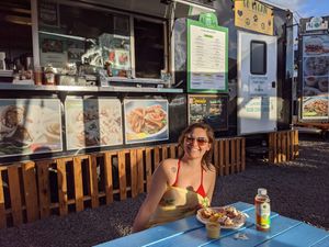 Enjoying My fish tacos, creme brûlée, & kombucha! at Earth Aloha Eats - Waikiki in Honolulu