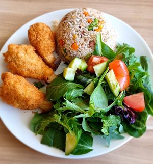 Mushroom drumsticks and amazing fried rice! at Just Vegan in Sunshine