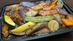 Vegan chicken with eggplant in a garlic sauce at Super Bowl Cuisine in Kingston