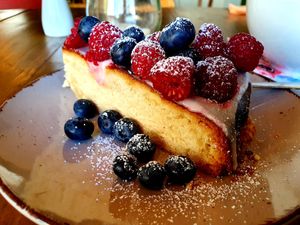 Lemon tarte with berries 😍 at Marny's in Dusseldorf