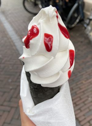 Oatly soft serve in cone with raspberry coulis for €3.50. The coulis (€1) was nothing special, but the cone was crispy and the soft serve was creamy and smooth. at STACH food in Utrecht