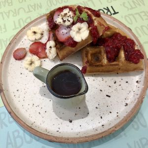 Berry Waffles with Maple Syrup at Nut and Bowls in New Delhi