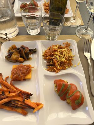 Grilled carrots, polenta with friggione, pasta alla Norma, grilled vegetables  at Trattoria Baraldi  in Bologna