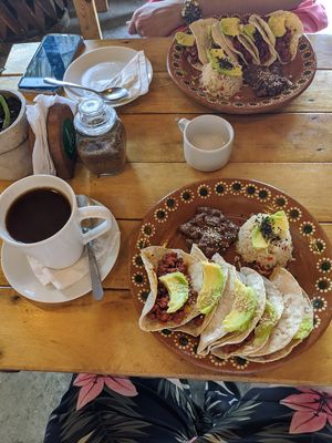 Vegan chorizo tacos with avocado and sesame seeds and coffee with coconut milk at Arte Sano in Holbox