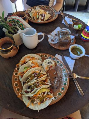 Vegan Chorizo tacos and vegan Al pastor tacos with chickpeas on the side with black beans and rice. Simply delicious! at Arte Sano in Holbox