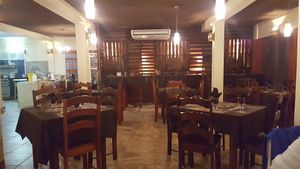 Inside & outside dining with bar at Erva's in San Ignacio