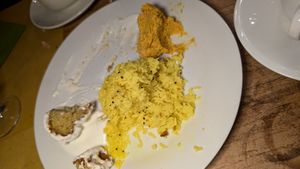 Vada with not vegan yogurt and rice at Bibliothe in Rome