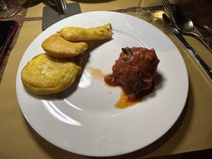 Apple, squash and potato pakora with side sauce, and   at Bibliothe in Rome