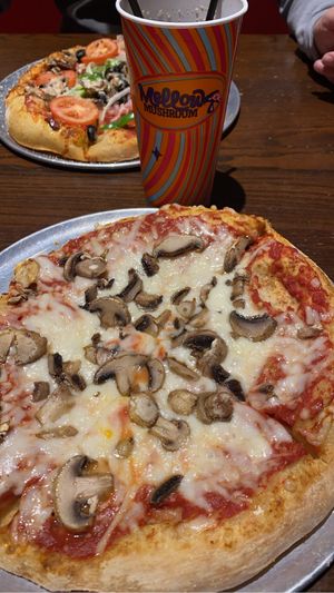 Mushroom n vegan cheese pizza (my partners is a non vegan one)   at Mellow Mushroom in Pigeon Forge
