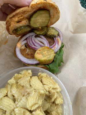 Inside Firecracker Chik’n Sandwich. Red onion, bread and butter pickles, kimchi, sriracha aioli   at Kelley Farm Kitchen in Harpers Ferry