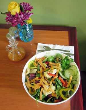 The Mediterranean Salad - with organic mixed greens, house marinated chickpeas & red onion, gourmet olives, diced tomato, artichoke heart, cucumber, red onion, and red pepper. at Kelley Farm Kitchen in Harpers Ferry