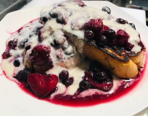 Cast iron French toast with champagne berries and a vegan creme cheese drizzle at Kelley Farm Kitchen in Harpers Ferry