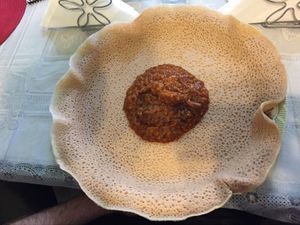 Miser wet - red lentil mixed with berbere prepared with onion and garlic  at Addis Abeba in Footscray