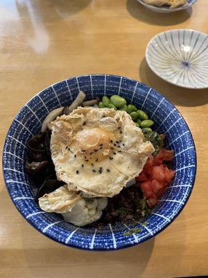 Lemon and basil bibimbap with a vegan fried egg  at Rén Lǐ Jū 仁里居 - Yuli Your Home in Taipei
