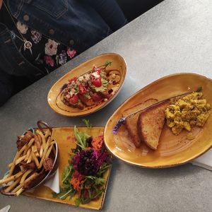 Tofu scramble, fricken n chips, avo toast, all devine! at Lemonwood Eatery in Okato