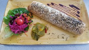 Satay tofu & vege parcel with side salad at Lemonwood Eatery in Okato