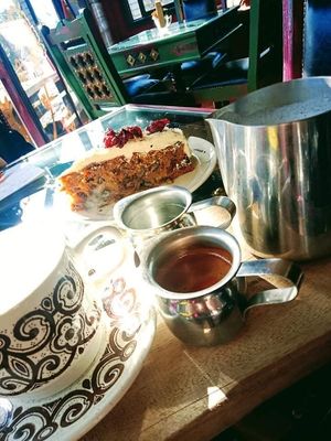 Make your own coffee with almond milk and v carrot cake! at Lemonwood Eatery in Okato