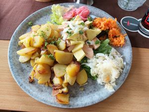Potatoes with sausage & cheese at Ulis Schlemmertreff in Baden Baden
