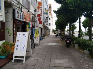 Looking down the street in direction to the port, the restaurant is on the left (where you can see the Indian flag) at Kerala Kitchen Ishigakijima - ケララキッチン石垣島 in Ishigaki