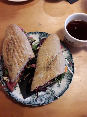 Vegan sandwich with sweet potato, apples, pickled onions and pesto. at Cafe FolkeVen in Aarhus