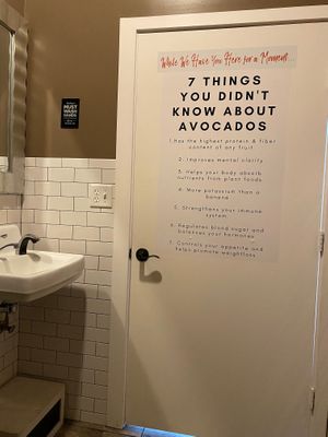 Bathroom door extolling the health benefits of avocado  at The Remedy Exchange in Wakefield