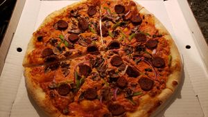 16" pizza w/casharella vegan cheese & housemade vegan pepperoni. Excellent sourdough crust. Fabulous overall. at Geek Love Cafe in Minneapolis