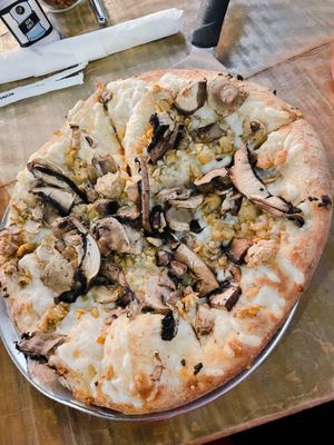 Small pizza with olive oil, vegan cheese, tempeh, portobello mushrooms, mushroom trio, and roasted garlic   at Mellow Mushroom in New Albany