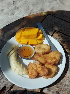 Pancakes, fruit & syrup at Flow Beach Cafe. - Seaddict in Koh Samet