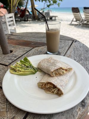 Hummus&mushroom wrap and iced latte with soy milk, 300b. Not worth it to be honest    at Flow Beach Cafe. - Seaddict in Koh Samet
