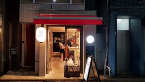 Outside (featuring friendly waitress) at Musubi in Tokyo