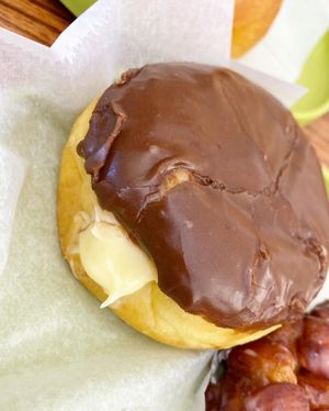 Chocolate iced Cream filled donut at Vegan Donut-Gelato in Houston