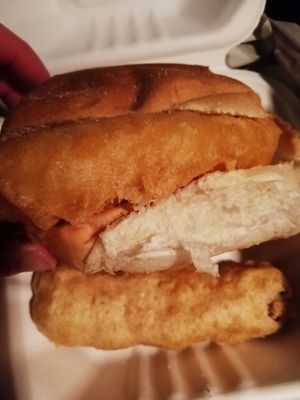 Fritter roll and battered vegan meat sausage at Gino's Fryer  in Largs