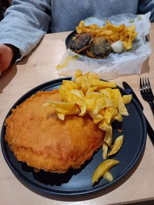 Vegan black pudding, chips and curry sauce.  And vegan pizza crunch and chips. at Gino's Fryer  in Largs