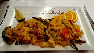 Vegan Paella served at table at Monica in Tenerife