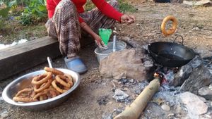 Outdoor cooking.... Yumm! at Mountain View Eco Farm in Lekhnath
