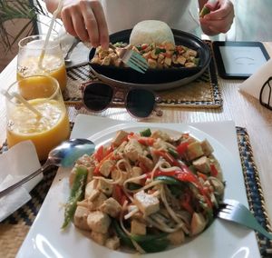 Tofu sisig, tofu noodles, mango shake at Le Voyage in Coron
