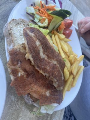 Vegan BLT with home made vegan bacon, chunky chips and salad.   at Olive Garden Deli in Tenerife