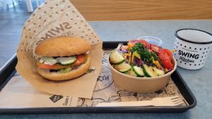 Schnitzel burger with fries and salad at Swing Kitchen - Georgenstraße in Berlin