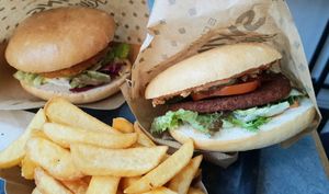 two burgers with french fries at Swing Kitchen - Georgenstraße in Berlin