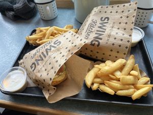Pink edgy burgers and fries (advertised as being smaller portion than others but still a good size)  at Swing Kitchen - Georgenstraße in Berlin