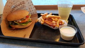 Schnitzel burger with fries and knoblauch (garlic) sauce at Swing Kitchen - Georgenstraße in Berlin