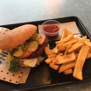 Pretty average burger and chips - but 100% vegan  at Swing Kitchen - Georgenstraße in Berlin