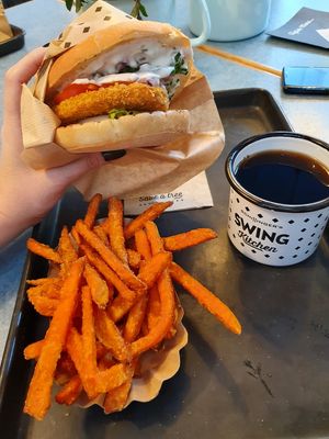 Schnitzel Burger + sweet potatoes fries + Swing Kitchen Cola at Swing Kitchen - Georgenstraße in Berlin