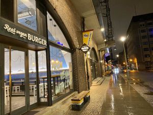 store front in rain at Swing Kitchen - Georgenstraße in Berlin