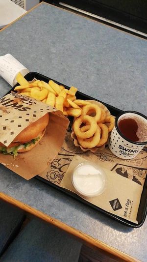 Fake chicken burger, fries and onion rings with some ice tea at Swing Kitchen - Georgenstraße in Berlin