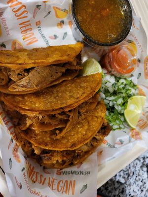 Birria tacos. Sauce and tacos are bomb! at Nissi Vegan in Austin