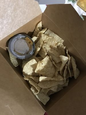 Lotsa chip. Little queso  at Nissi Vegan in Austin