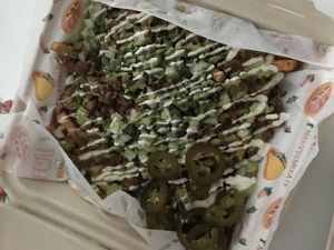 The fries!!! I forgot the name but mmmmm so good  at Nissi Vegan in Austin