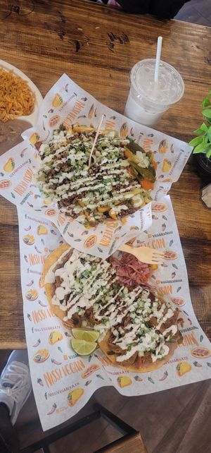 Carne asada fries and chalupas at Nissi Vegan in Austin